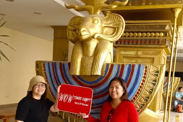 Two smiling ladies visiting Karnak Temple in Luxor beside the solar boat of the god Amun-Ra // Luxor front (11)